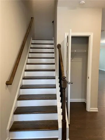 a view of entryway with wooden floor