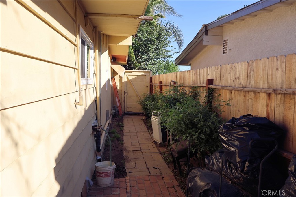 1261 North Rancho Avenue Colton, CA 92324 - Photo 11 of 27 a view of a house with a backyard