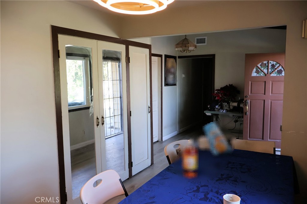 1261 North Rancho Avenue Colton, CA 92324 - Photo 18 of 27 a view of entryway with wooden floor