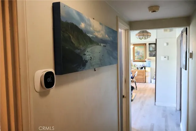 a bathroom with a shower and a sink