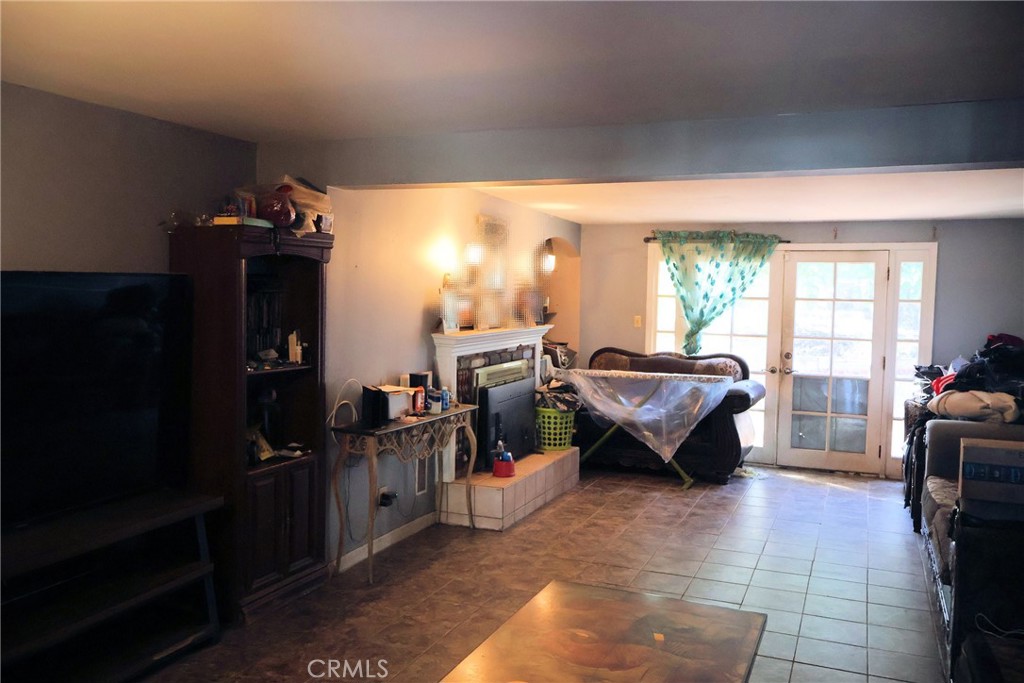 1261 North Rancho Avenue Colton, CA 92324 - Photo 24 of 27 a living room with furniture and a window