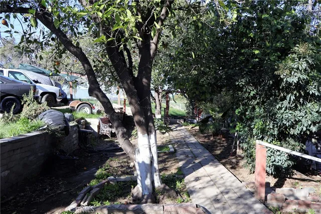 a backyard of a house with lots of green space