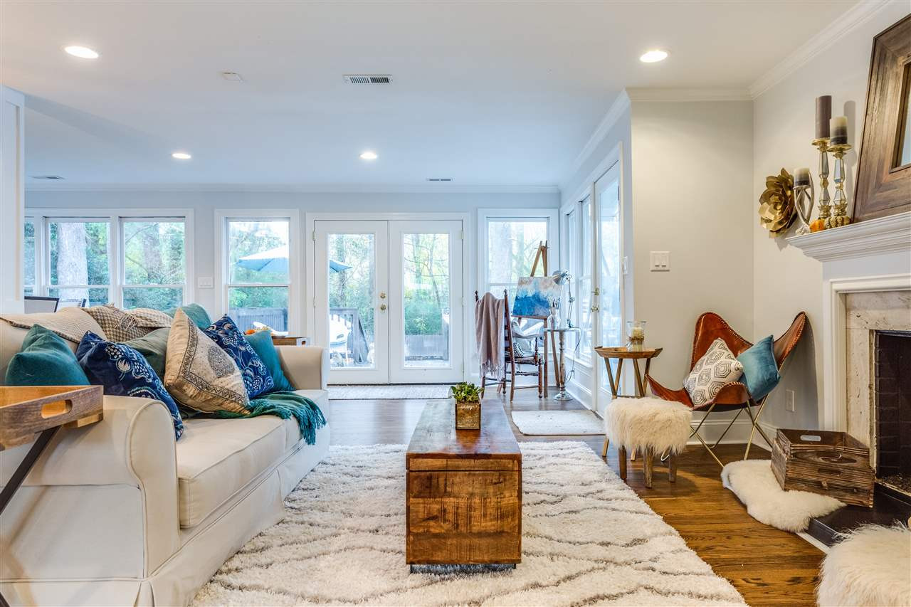 2715 Rothgeb Drive Raleigh, NC 27609 - Photo 7 of 25 TONS OF NATURAL LIGHT WITH SUCH A PRIVATE FEEL TO THE BACK OF THE HOME. Family Room