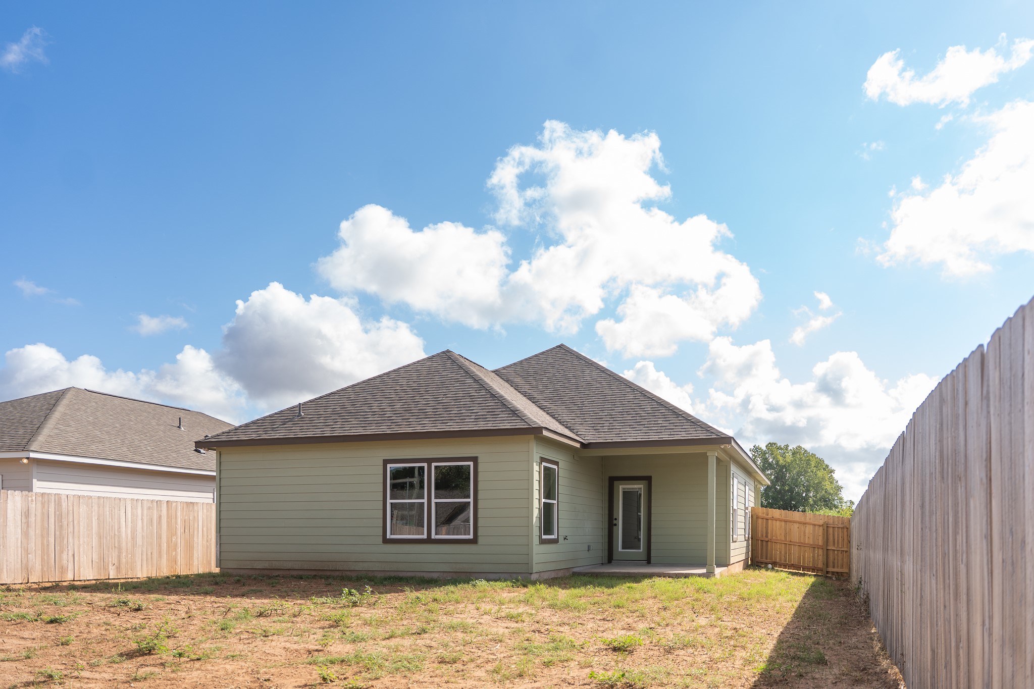 305 String Prairie Way Smithville, TX 78957 - Photo 26 of 26 a view of a house with a backyard