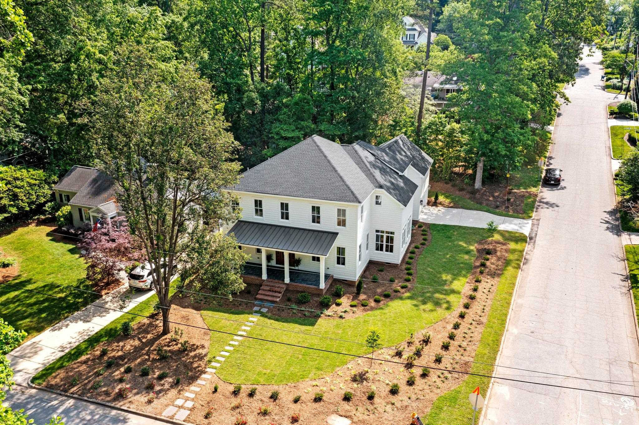 1500 Banbury Road Raleigh, NC 27607 - Photo 36 of 39 Great corner lot in Sunset Hills with wonderful curb appeal, professionally landscaped. Exterior Front