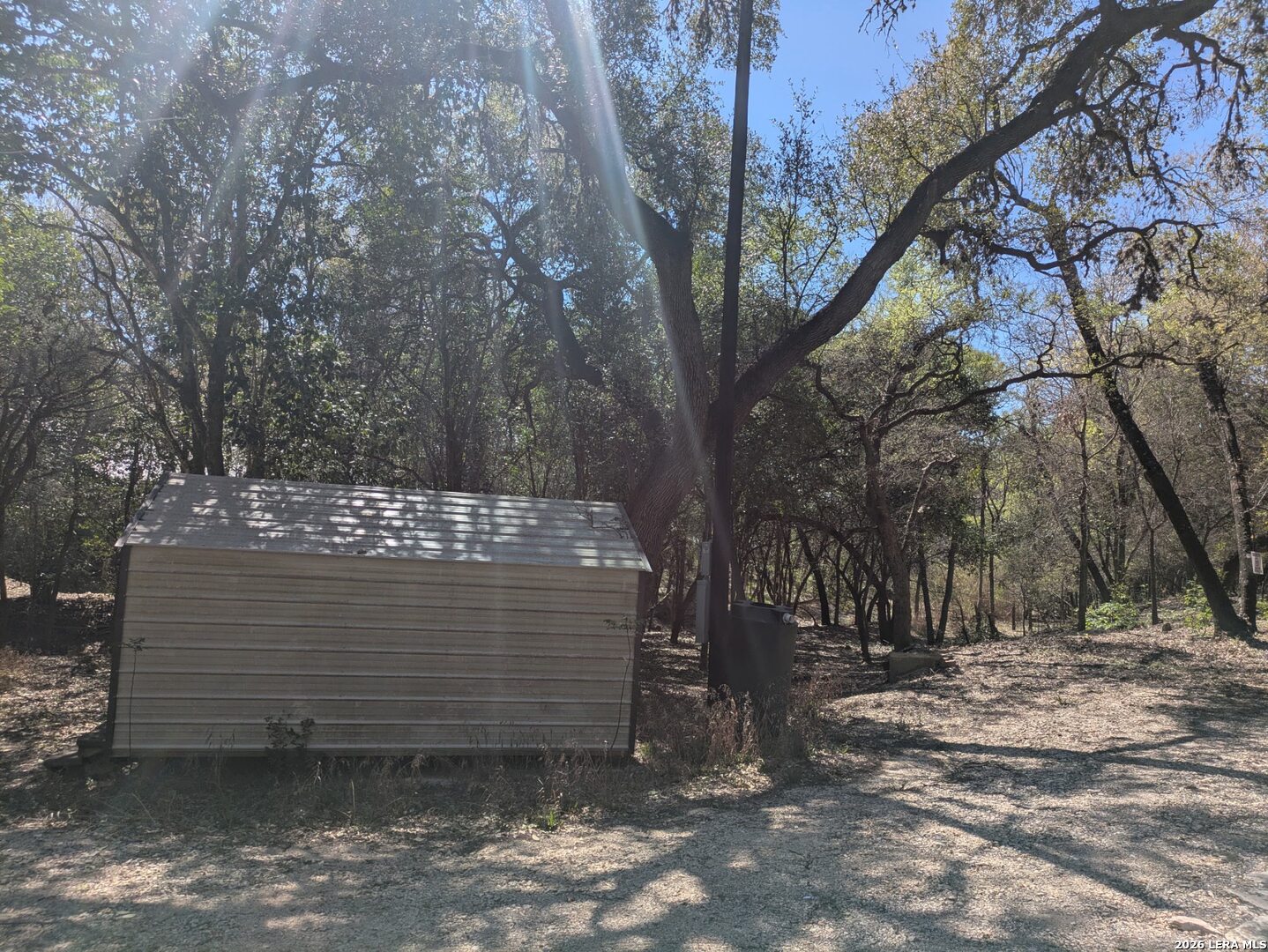 19612 Greenhill Drive Helotes, TX 78023 - Photo 2 of 3 a view of outdoor space with trees