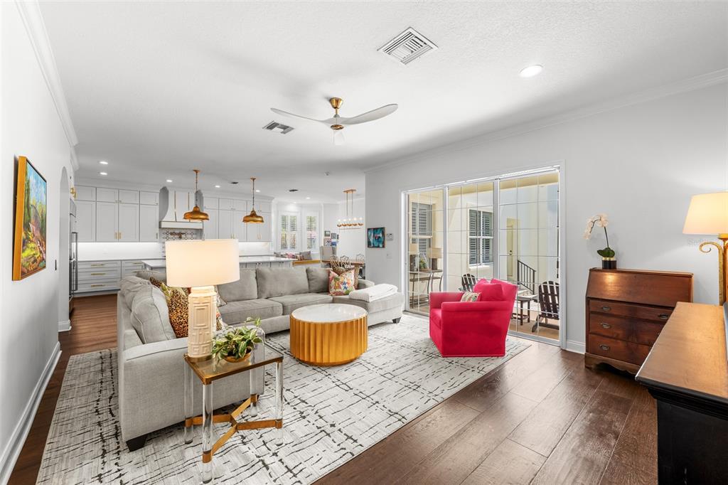 11 Formosa Avenue Tampa, FL 33606 - Photo 24 of 53 a living room with furniture and a wooden floor