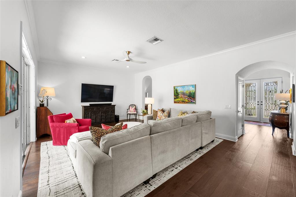 11 Formosa Avenue Tampa, FL 33606 - Photo 25 of 53 a living room with furniture and a flat screen tv
