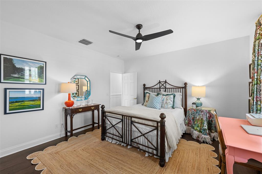 11 Formosa Avenue Tampa, FL 33606 - Photo 33 of 53 a bedroom with a bed and a table in it