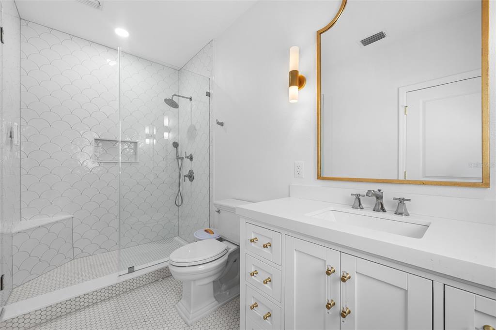 11 Formosa Avenue Tampa, FL 33606 - Photo 41 of 53 a bathroom with a sink a toilet and shower