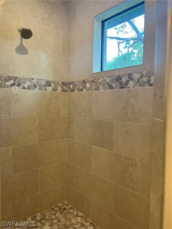 2615 27th Street West Lehigh Acres, FL 33971 - Photo 16 of 17 a bathroom with a window