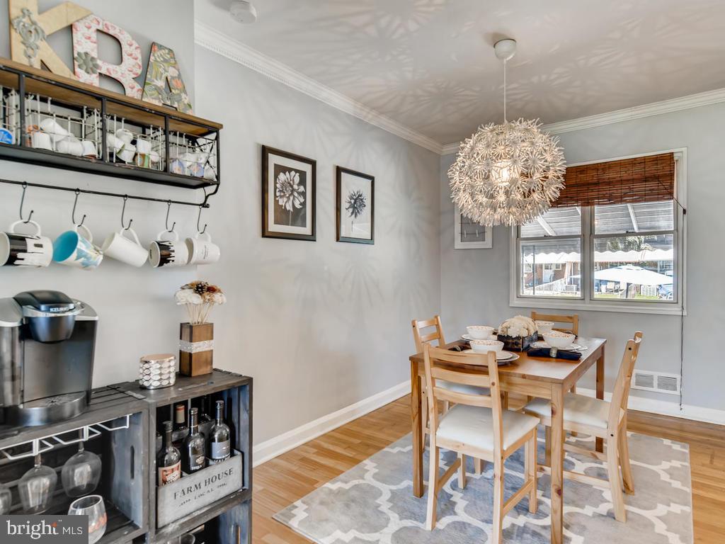1906 Holborn Road Baltimore, MD 21222 - Photo 6 of 29 Modern fixture casts decorative light throughout!