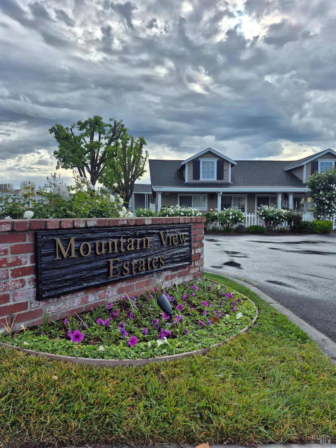 246 Apple Lane Santa Rosa, CA 95407 - Photo 8 of 12 a view of a garden with wooden fence