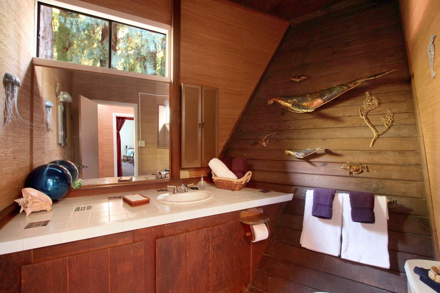 220 Shadowbrook Road Ben Lomond, CA 95005 - Photo 23 of 24 a bathroom with a sink and a mirror