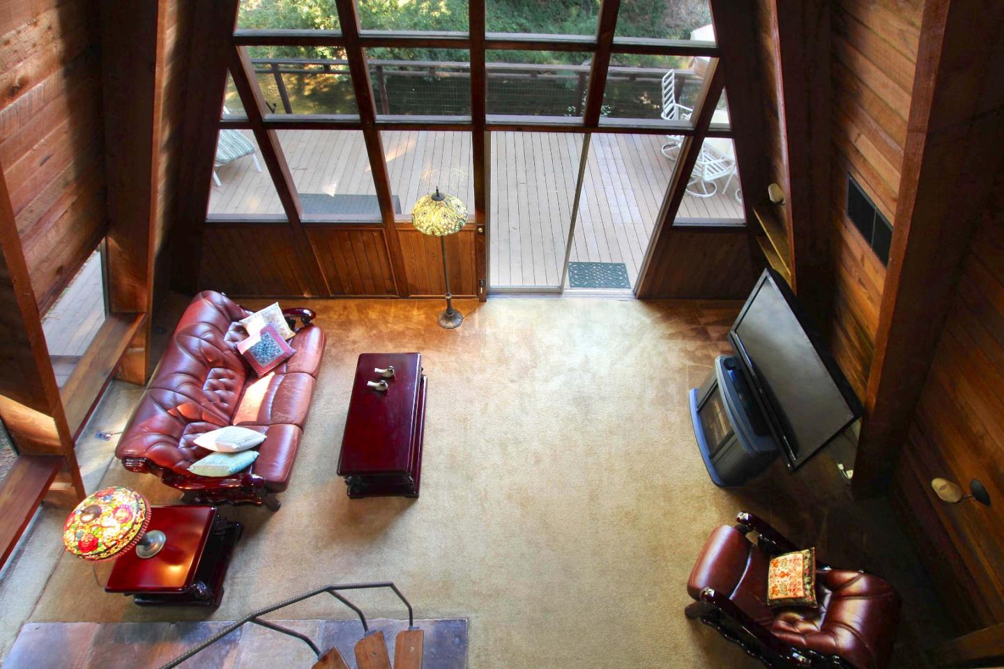 220 Shadowbrook Road Ben Lomond, CA 95005 - Photo 10 of 24 a living room with furniture and a window