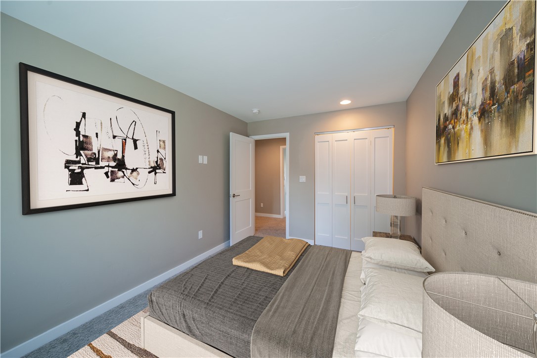 Second of (4) total bedrooms. Virtual staging.