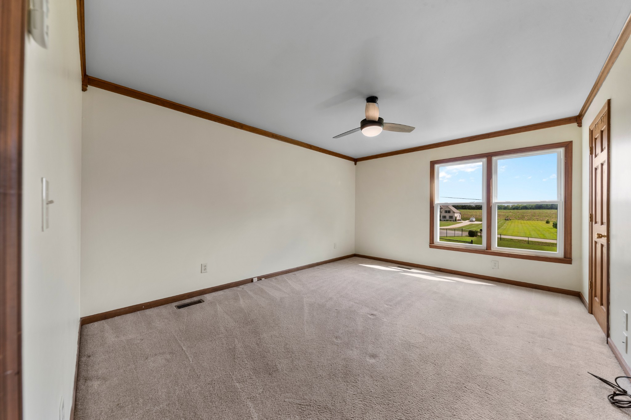 1056 South Cross Bridges Road Mount Pleasant, TN 38474 - Photo 15 of 30 a view of an empty room with a window