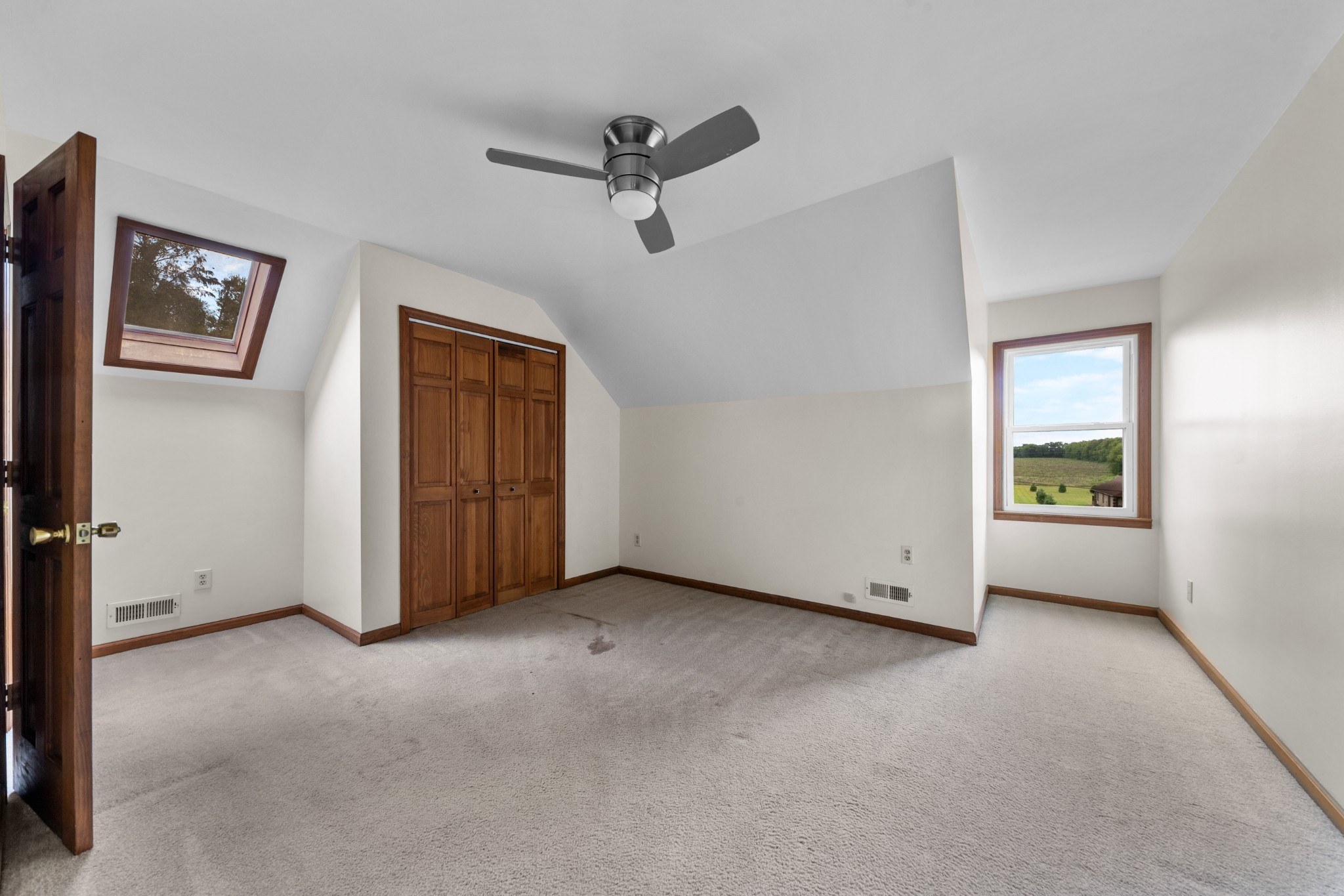1056 South Cross Bridges Road Mount Pleasant, TN 38474 - Photo 21 of 30 an empty room with windows and closet