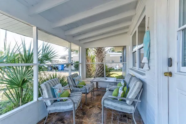 a living room filled with furniture