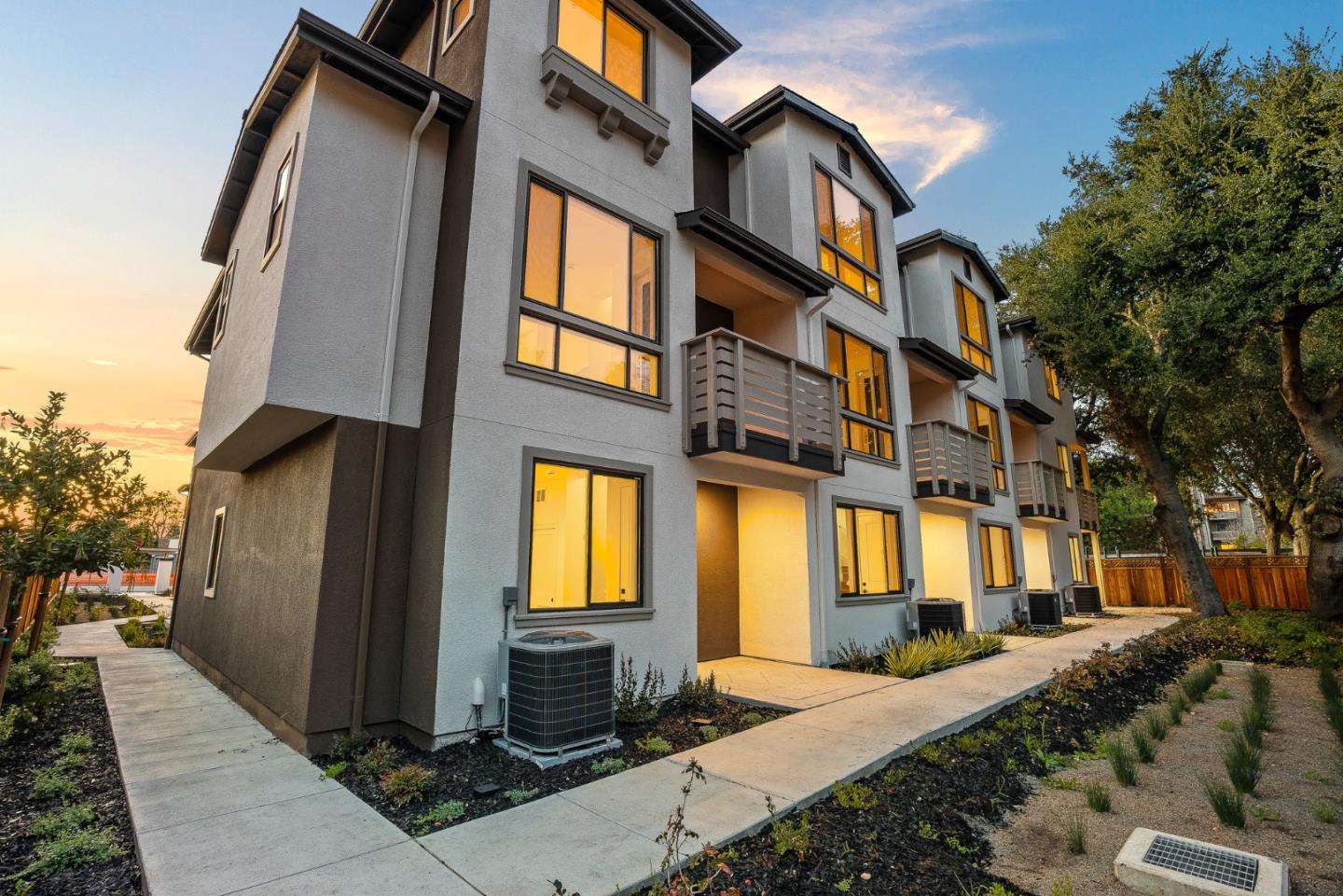 955 Woodside Road Redwood City, CA 94061 - Photo 2 of 46 a front view of a house