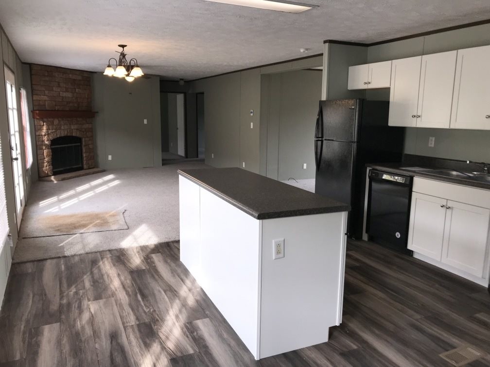 157 Buckner Road Philadelphia, TN 37846 - Photo 12 of 30 a kitchen with granite countertop a refrigerator and a stove