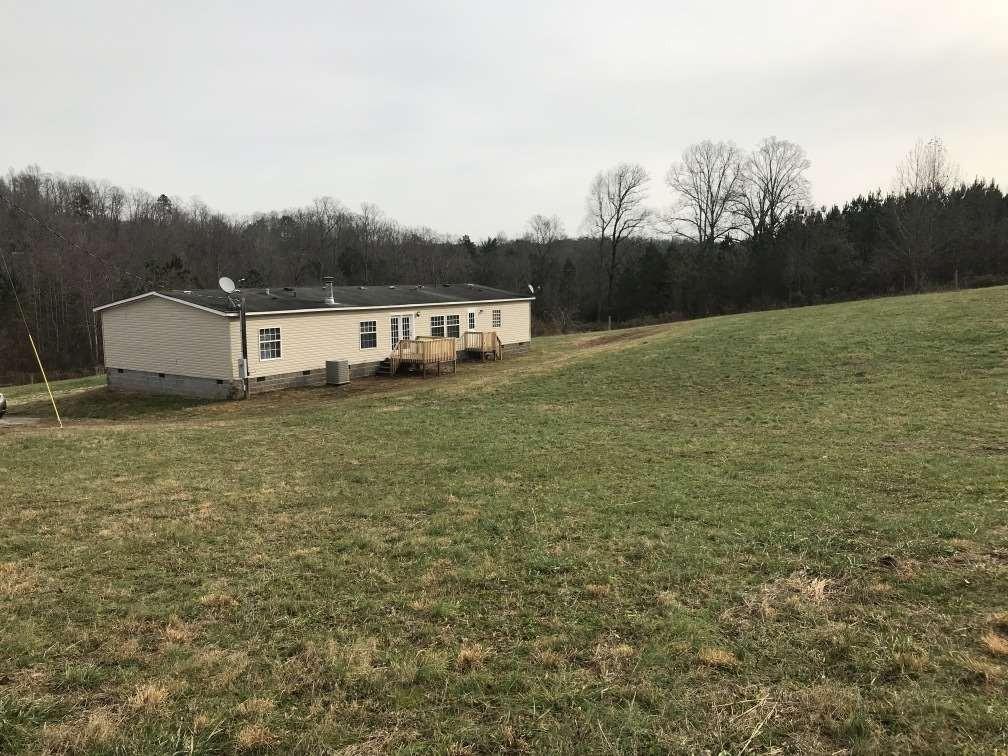 157 Buckner Road Philadelphia, TN 37846 - Photo 22 of 30 a view of a terrace with a garden