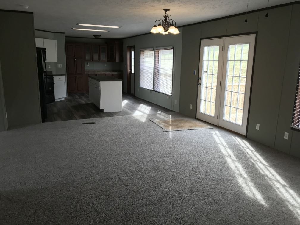 157 Buckner Road Philadelphia, TN 37846 - Photo 7 of 30 a view of a kitchen with a sink oven and large window