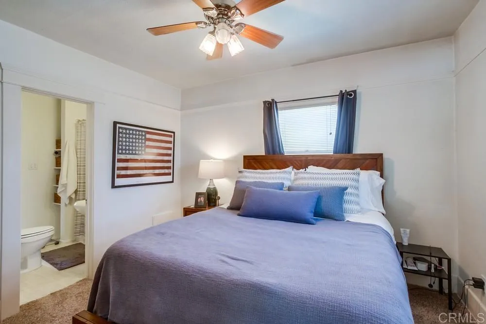 4217 Third Avenue San Diego, CA 92103 - Photo 14 of 16 a bedroom with a bed and window