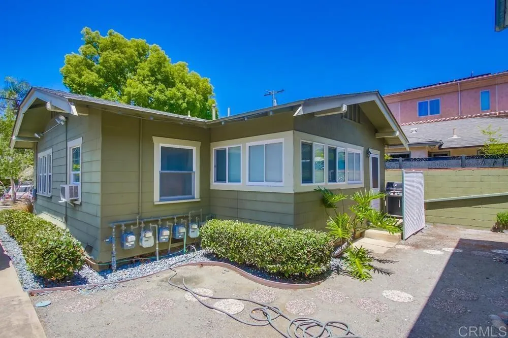4217 Third Avenue San Diego, CA 92103 - Photo 5 of 16 a front view of a house with a yard