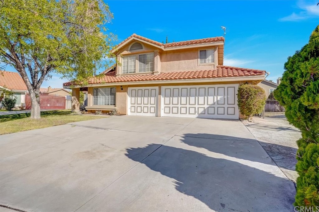 7202 Goldboro Lane Riverside, CA 92506 - Photo 1 of 1 a front view of a house with a yard