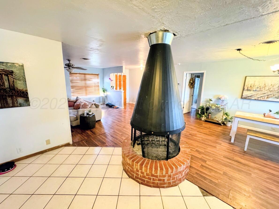 1010 Northwestern Street Perryton, TX 79070 - Photo 6 of 16 1010 NORTHWESTERN FIREPLACE