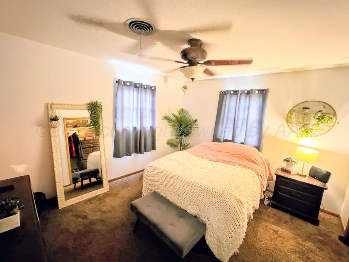 1010 Northwestern Street Perryton, TX 79070 - Photo 7 of 16 1010 NORTHWESTERN PRIMARY BEDROOM