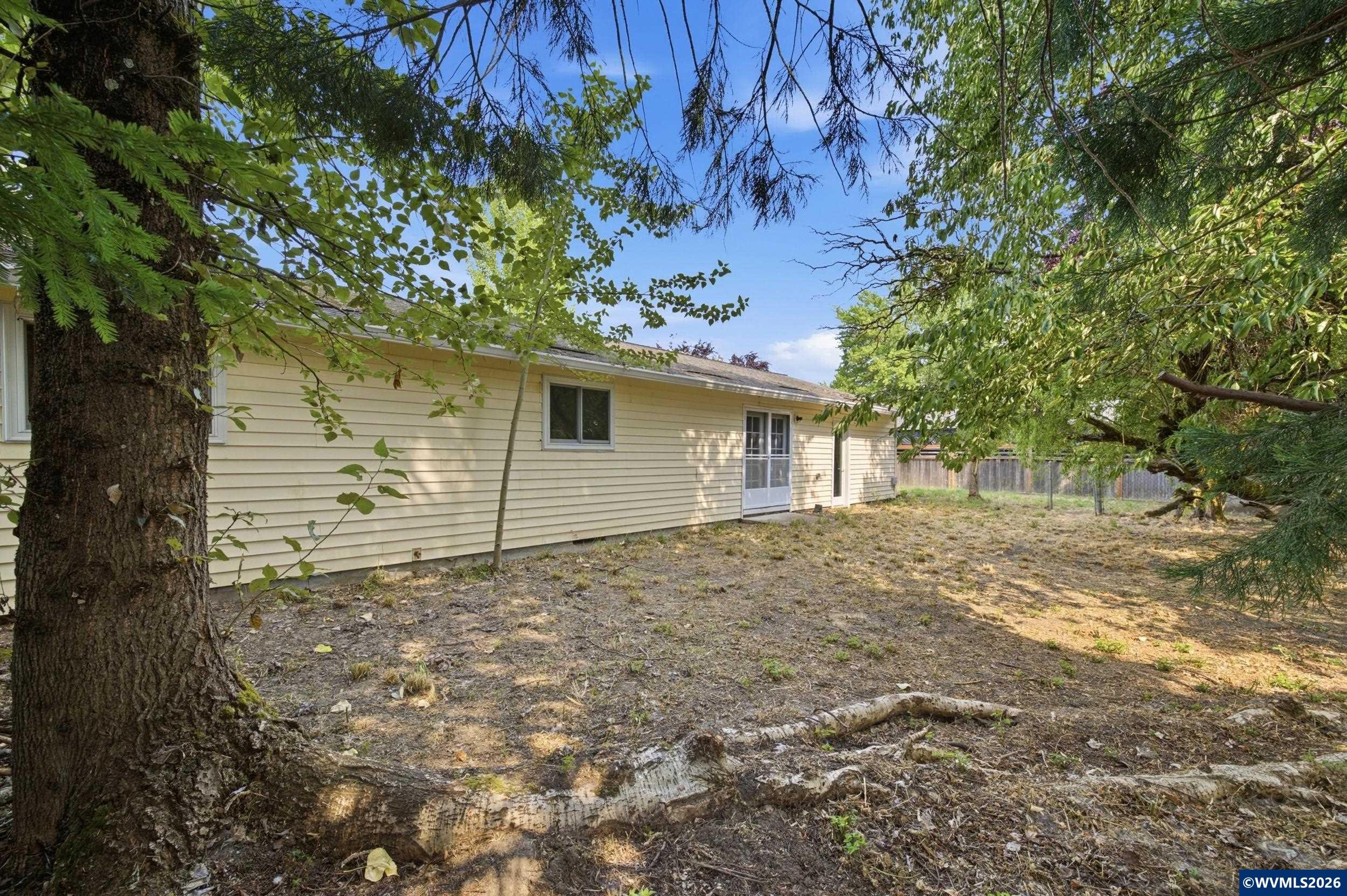 1213 Hemlock Loop Independence, OR 97351 - Photo 27 of 28 a view of a house with a tree
