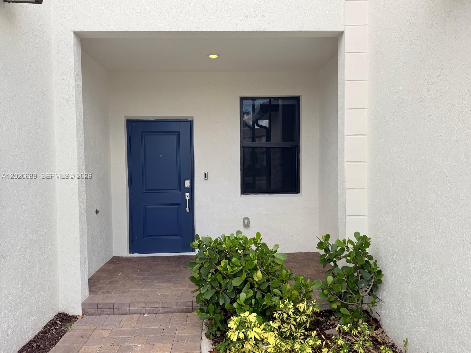 12875 Southwest 231st Terrace Miami, FL 33170 - Photo 3 of 25 a front view of a house