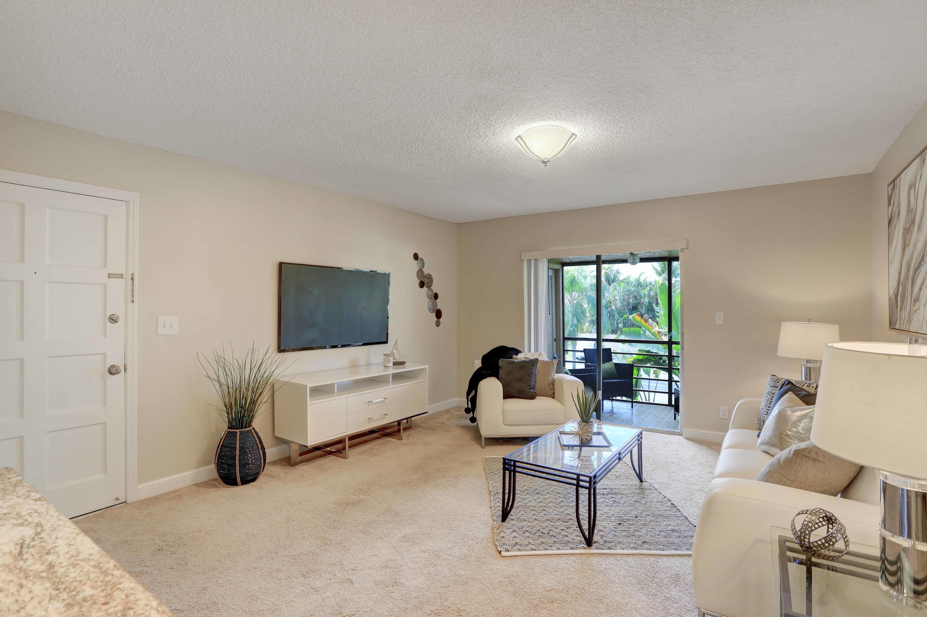 1291 Northwest 13th Street, Unit 448D Boca Raton, FL 33486 - Photo 3 of 25 IMG_1947_48_49_50_51