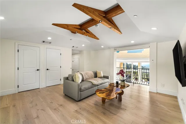 a view of a table and chairs in a garden