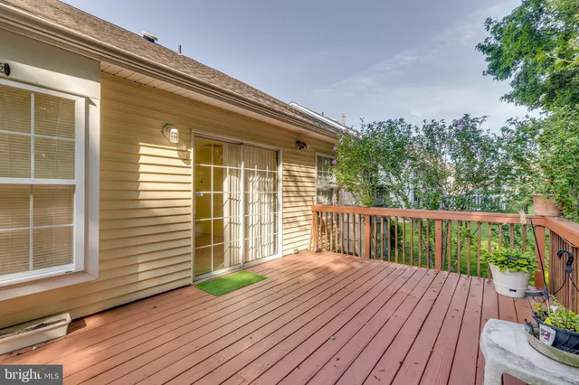 a balcony with wooden floor