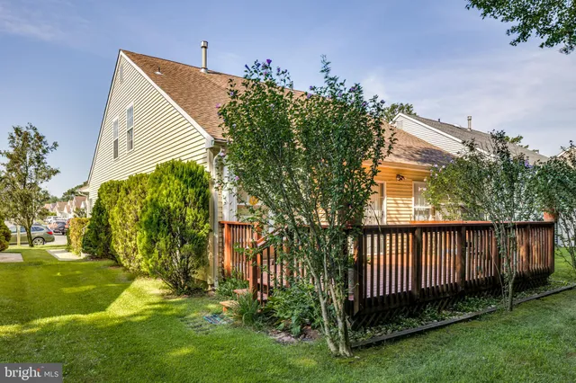 a view of a back yard of the house