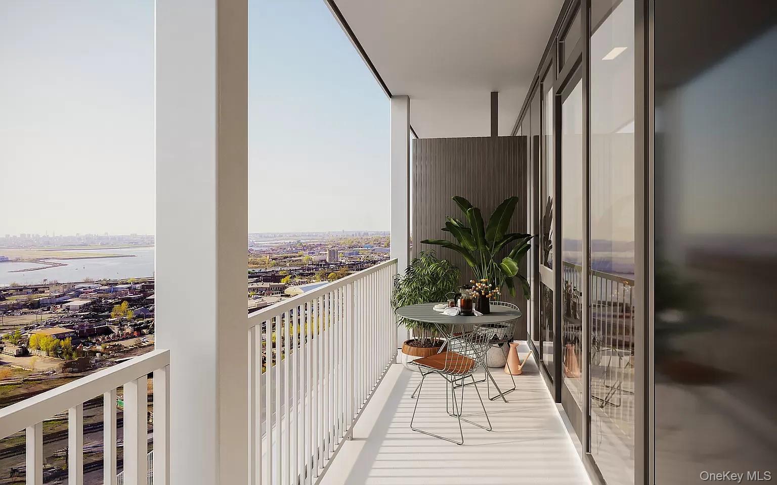 131-02 40th Road, Unit 9O Queens, NY 11354 - Photo 22 of 24 a view of balcony and deck