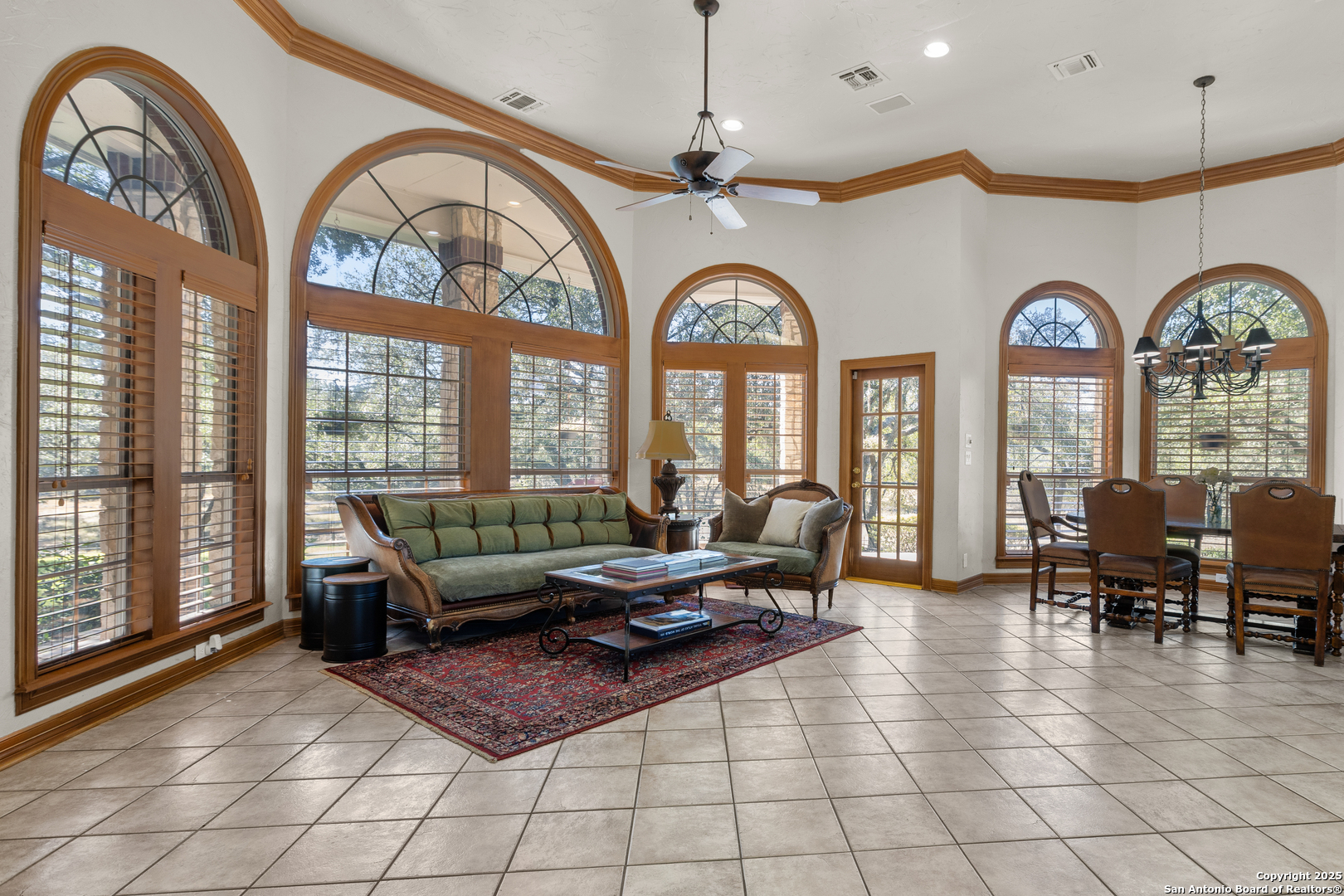 8040 Rolling Acres Trail Fair Oaks Ranch, TX 78015 - Photo 14 of 65 a living room with furniture and a large window