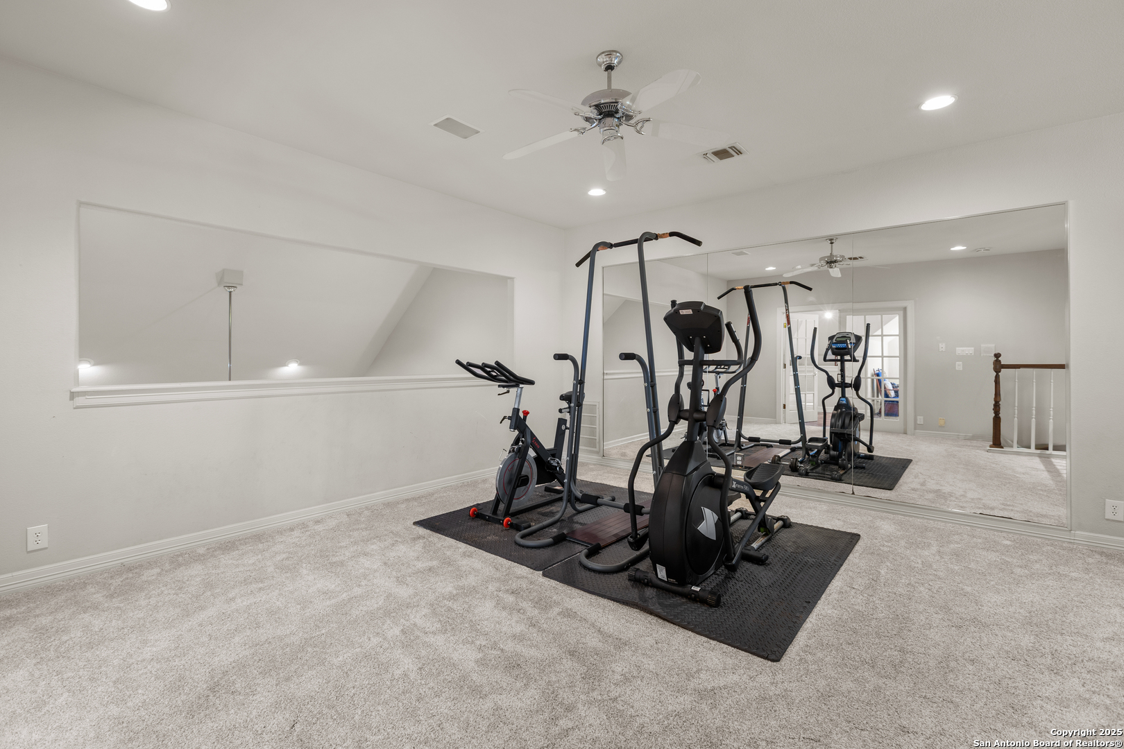 8040 Rolling Acres Trail Fair Oaks Ranch, TX 78015 - Photo 31 of 65 a view of a room with gym equipment