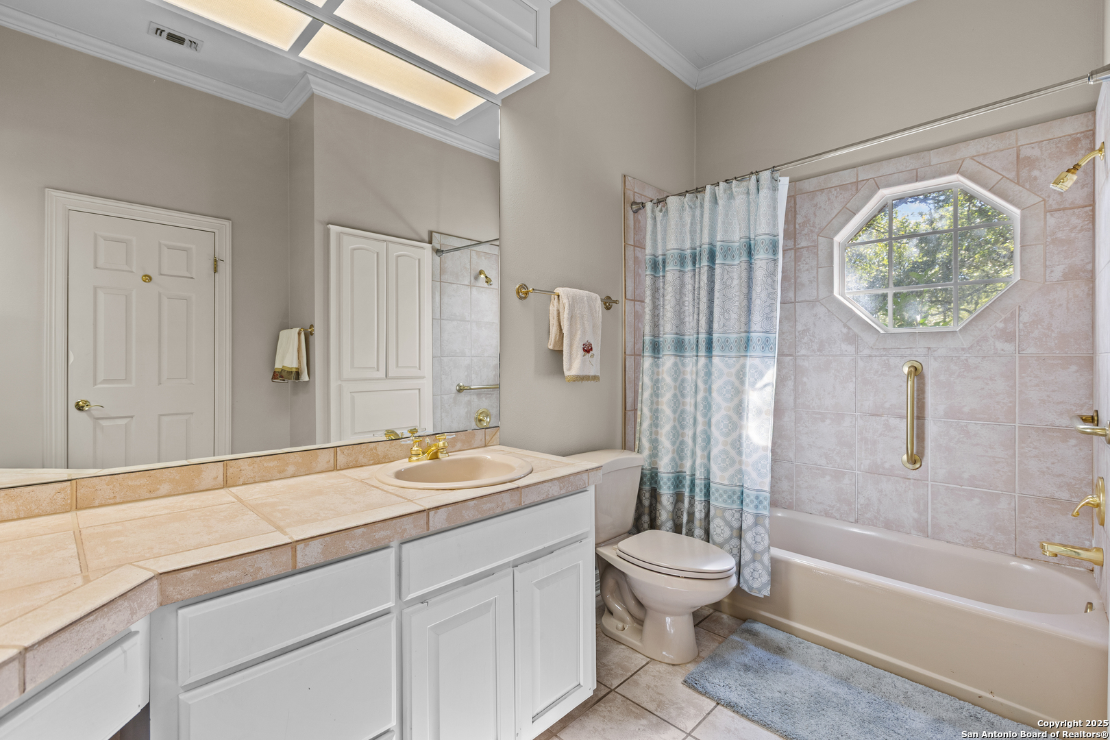 8040 Rolling Acres Trail Fair Oaks Ranch, TX 78015 - Photo 36 of 65 a bathroom with a granite countertop sink toilet and shower