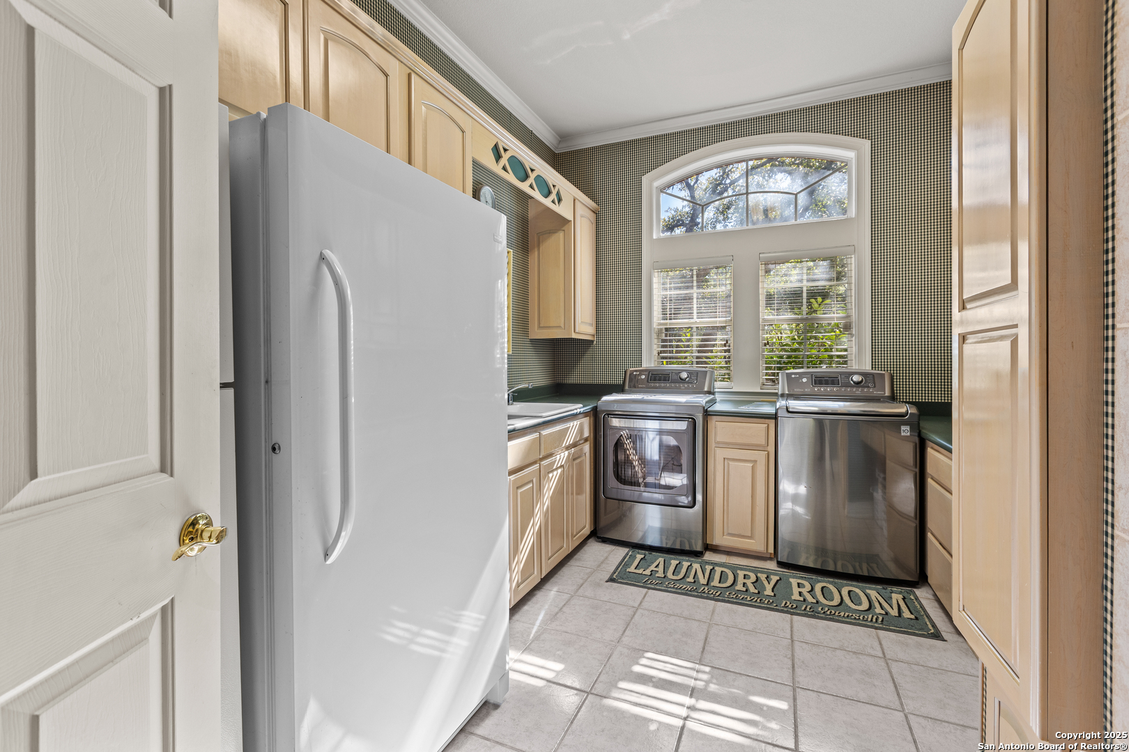 8040 Rolling Acres Trail Fair Oaks Ranch, TX 78015 - Photo 37 of 65 a kitchen with stainless steel appliances granite countertop a refrigerator and a stove