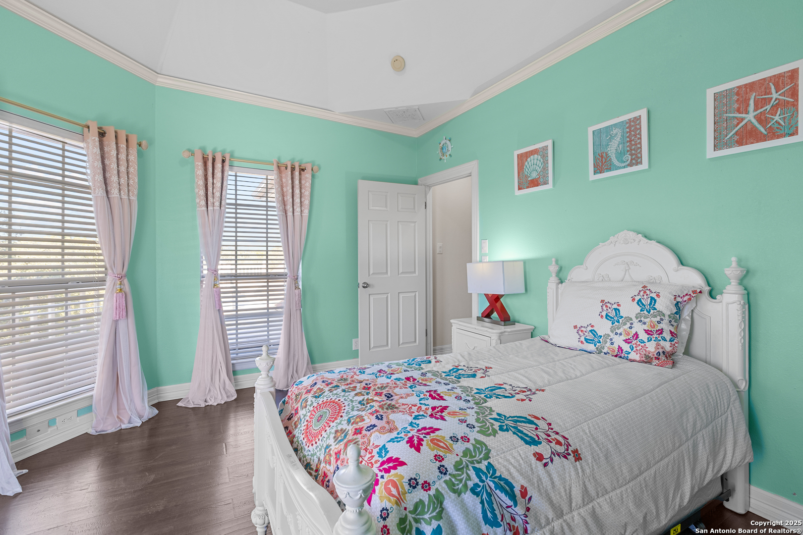 8040 Rolling Acres Trail Fair Oaks Ranch, TX 78015 - Photo 49 of 65 a bedroom with a bed and a window