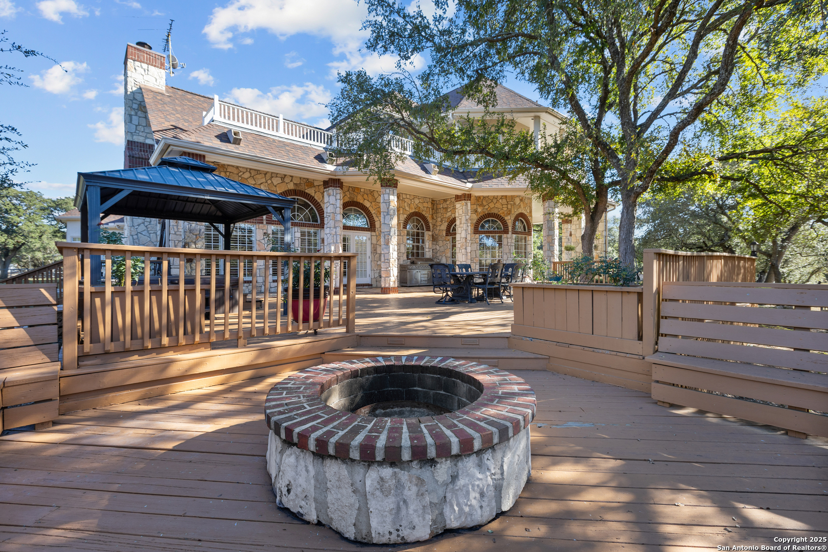 8040 Rolling Acres Trail Fair Oaks Ranch, TX 78015 - Photo 53 of 65 a view of a house with a patio
