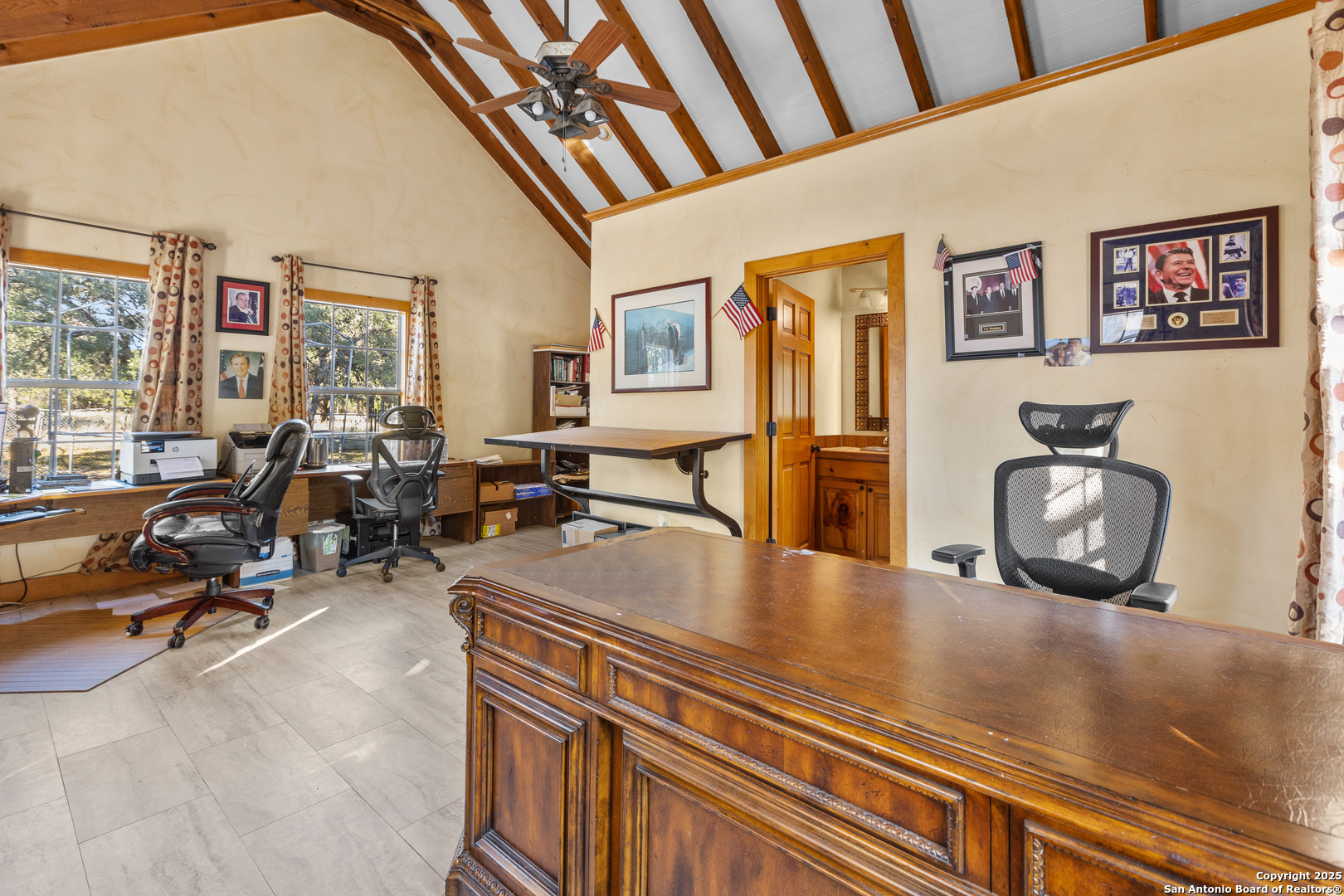 8040 Rolling Acres Trail Fair Oaks Ranch, TX 78015 - Photo 58 of 65 a view of a living room and workspace with furniture