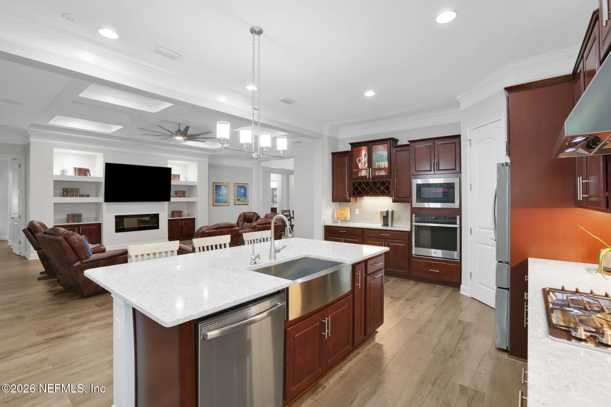 4460 Barkoskie Road Jacksonville, FL 32258 - Photo 22 of 80 a large kitchen with a table and chairs