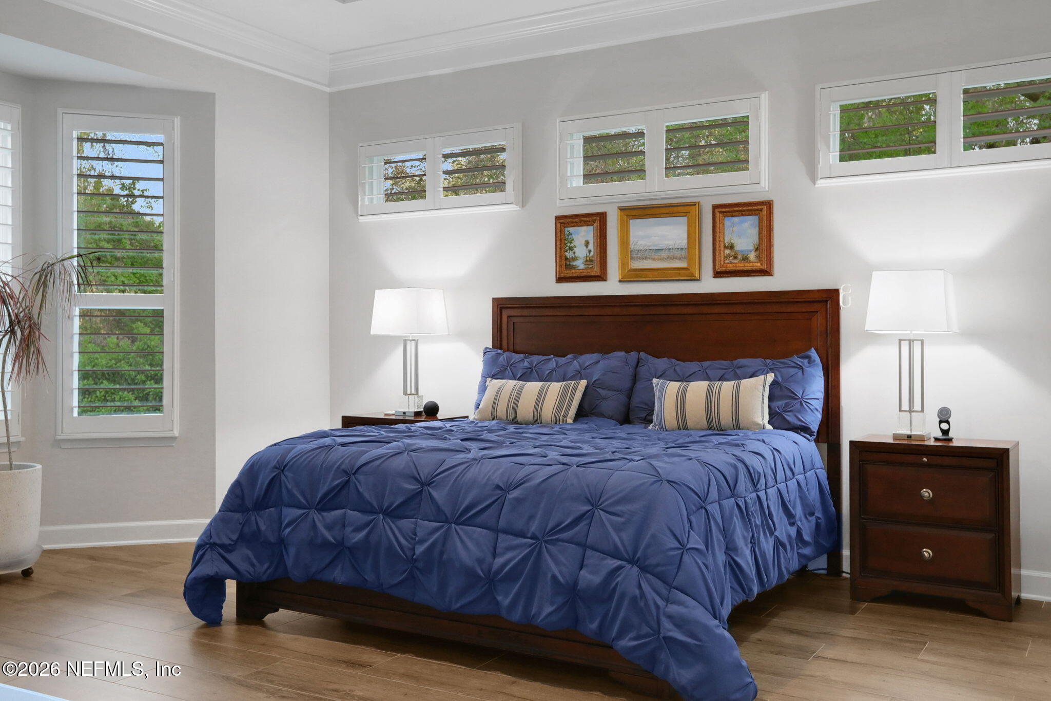 4460 Barkoskie Road Jacksonville, FL 32258 - Photo 27 of 80 a bedroom with a bed and a night stand