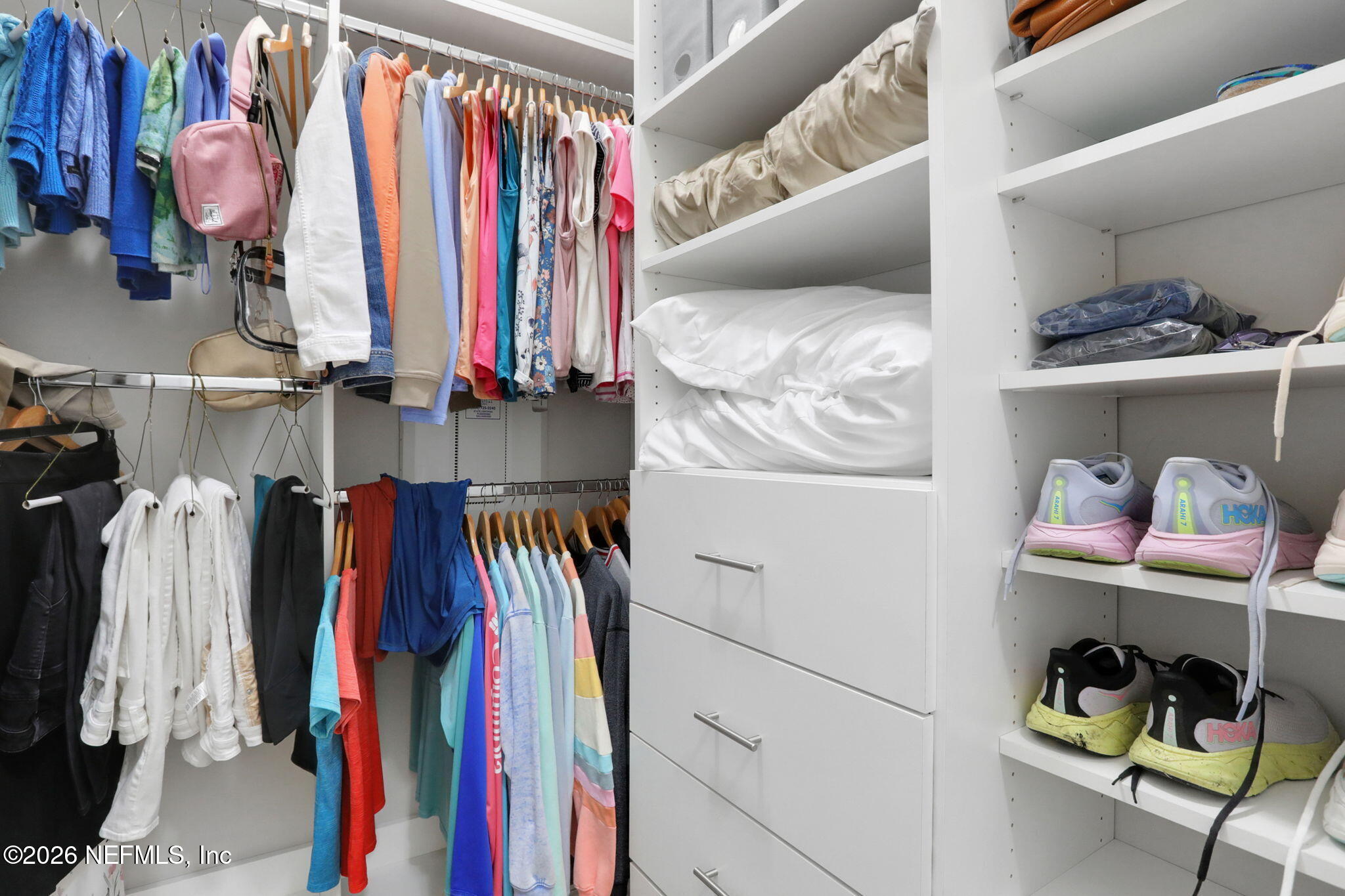 4460 Barkoskie Road Jacksonville, FL 32258 - Photo 32 of 80 a view of walk in closet with clothes and shoes