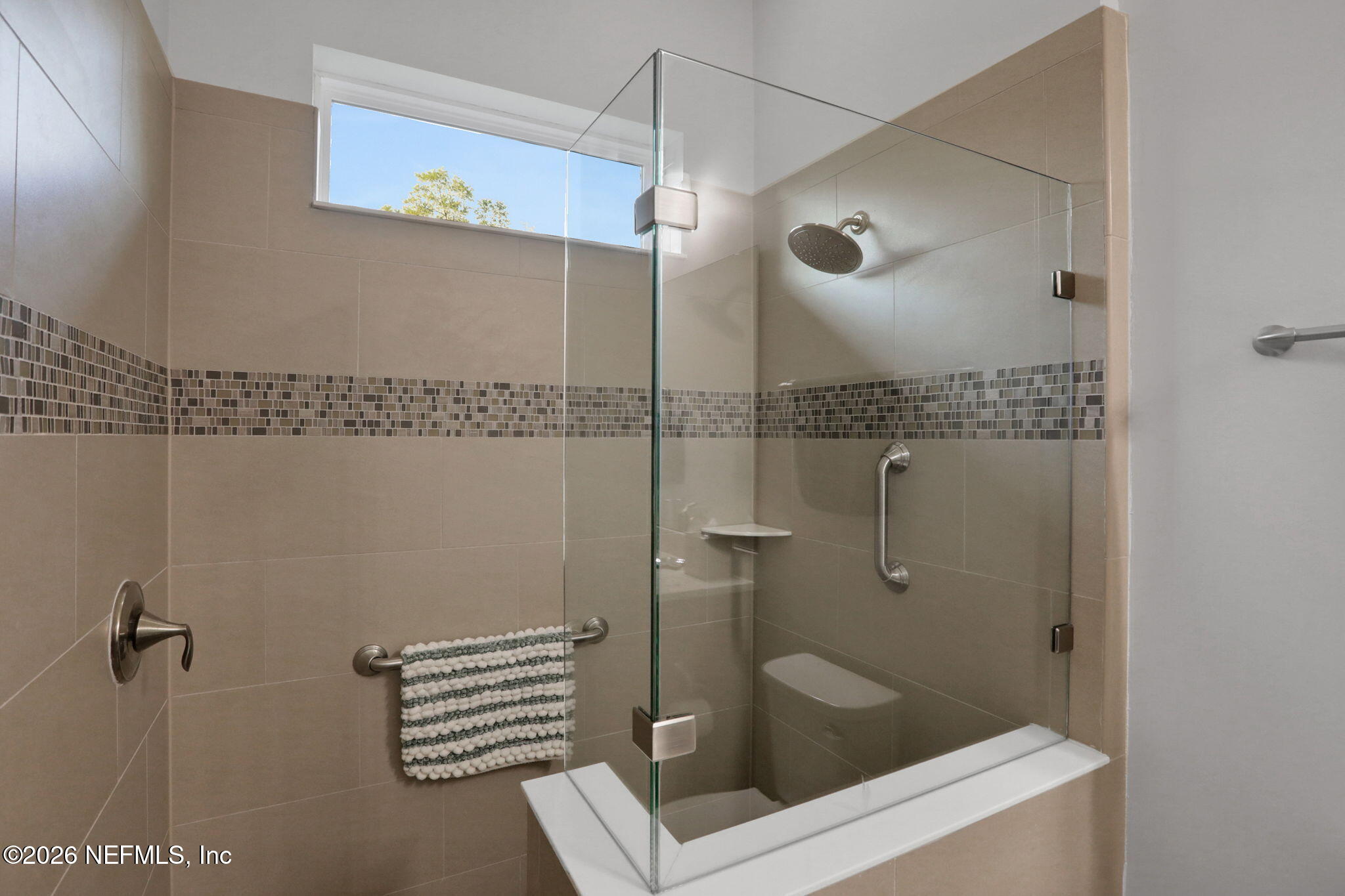 4460 Barkoskie Road Jacksonville, FL 32258 - Photo 39 of 80 a bathroom with a shower and a sink
